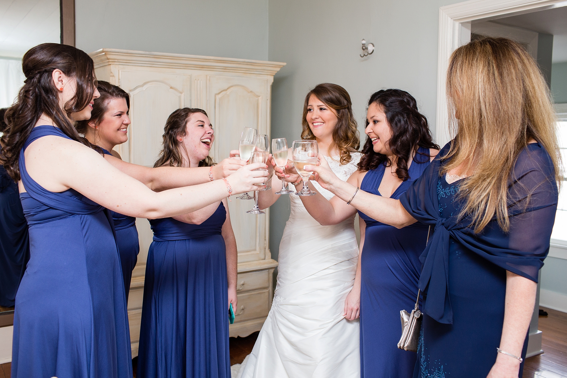 bridesmaids toasting champagne