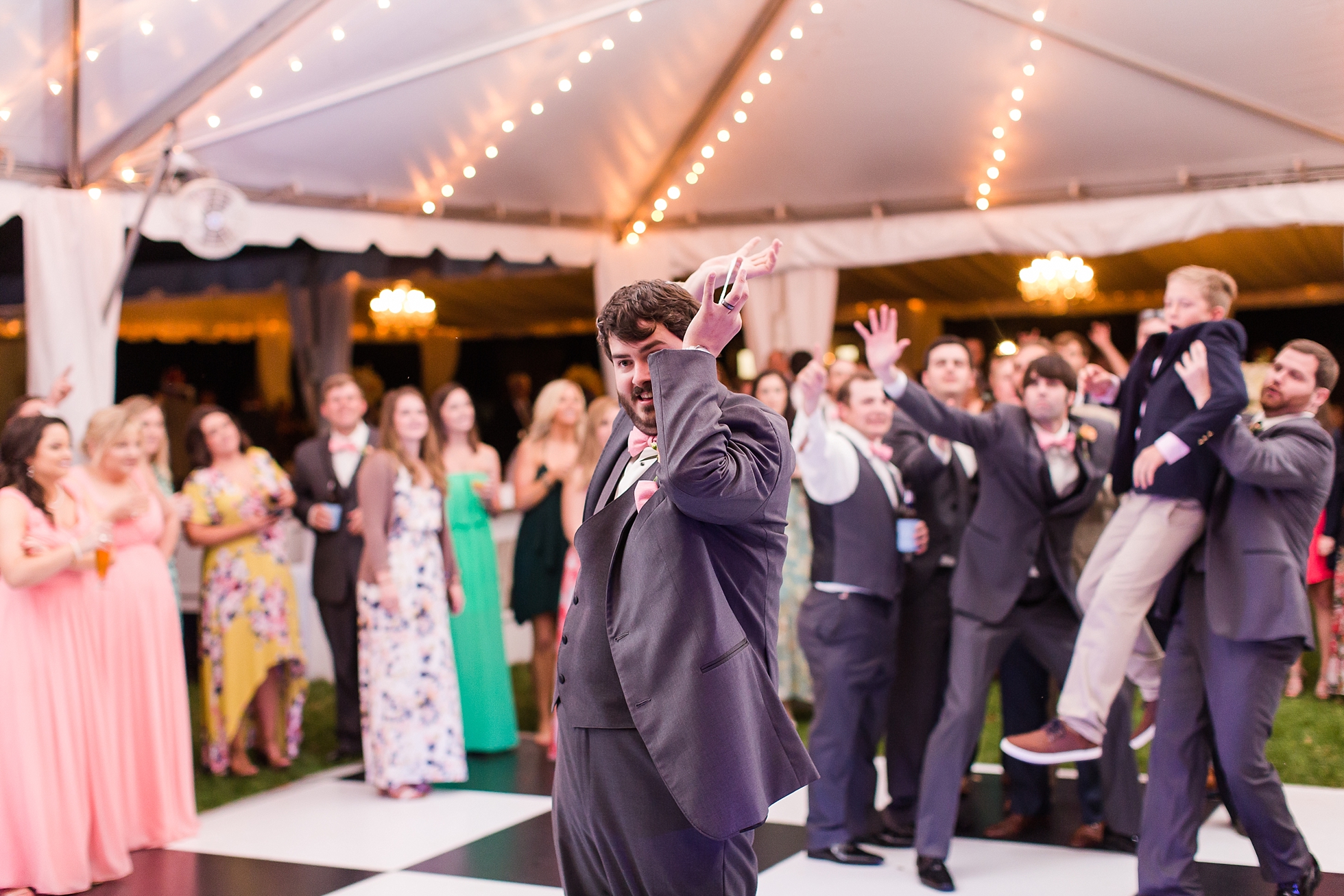 garter toss wedding photos