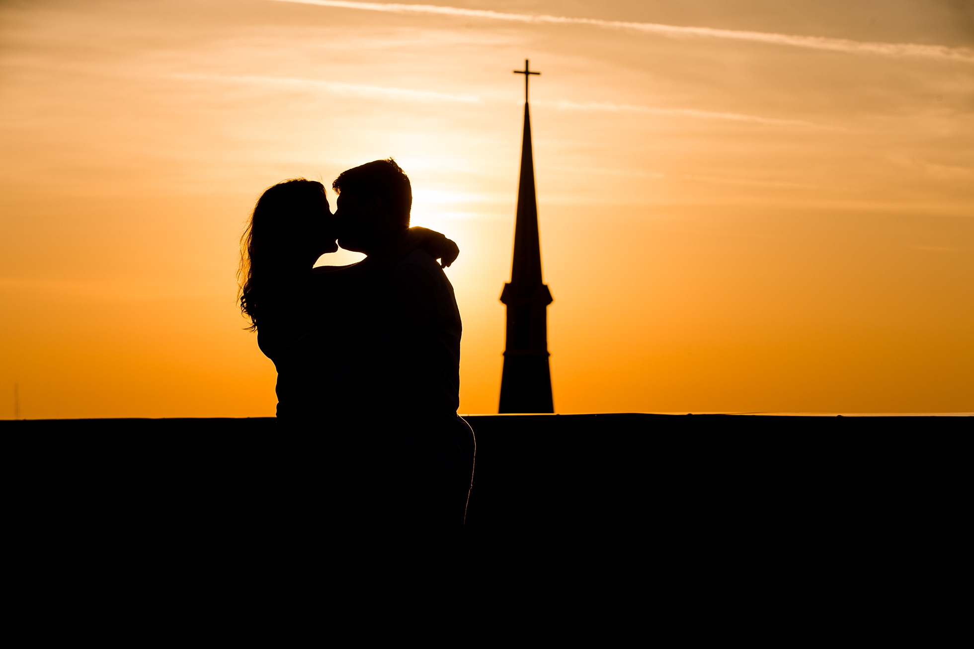 sunset rooftop silhouette engagement