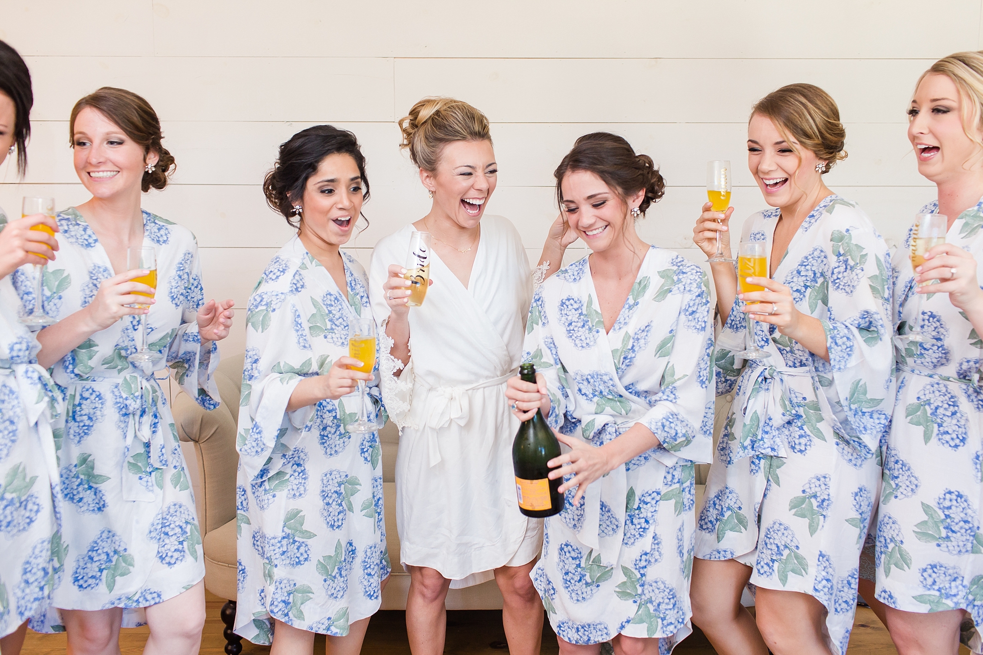 champagne bridesmaids getting ready