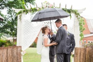 georgia rainy wedding ceremony umbrella