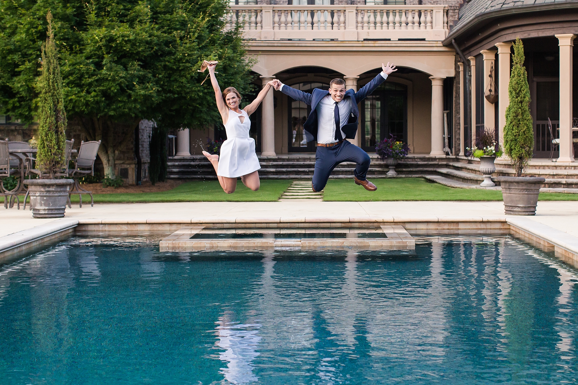 jumping into pool elopement wedding photographer