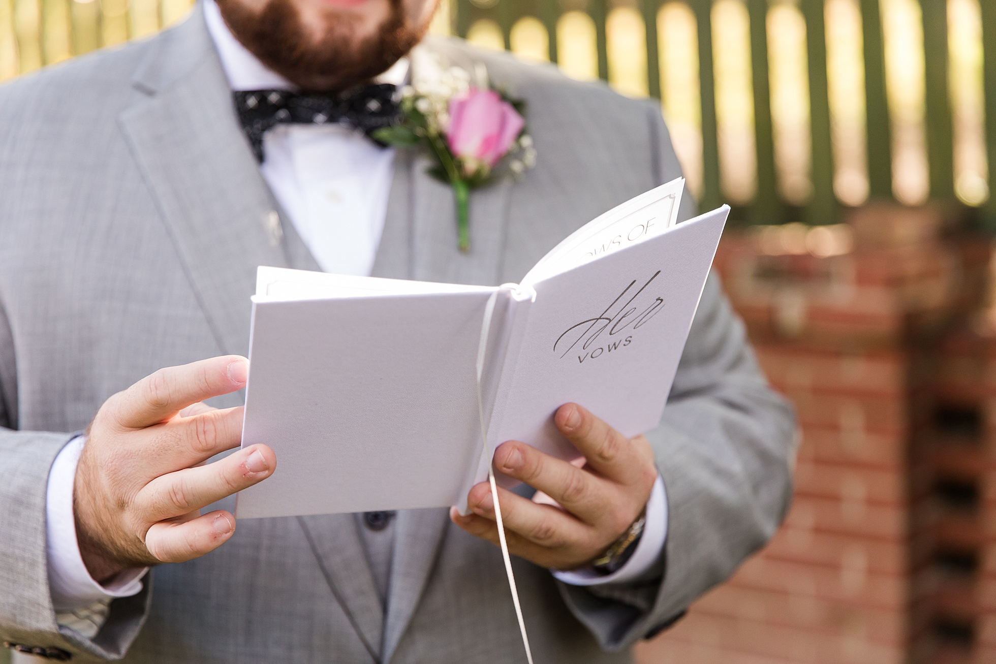 groom reading vows wedding