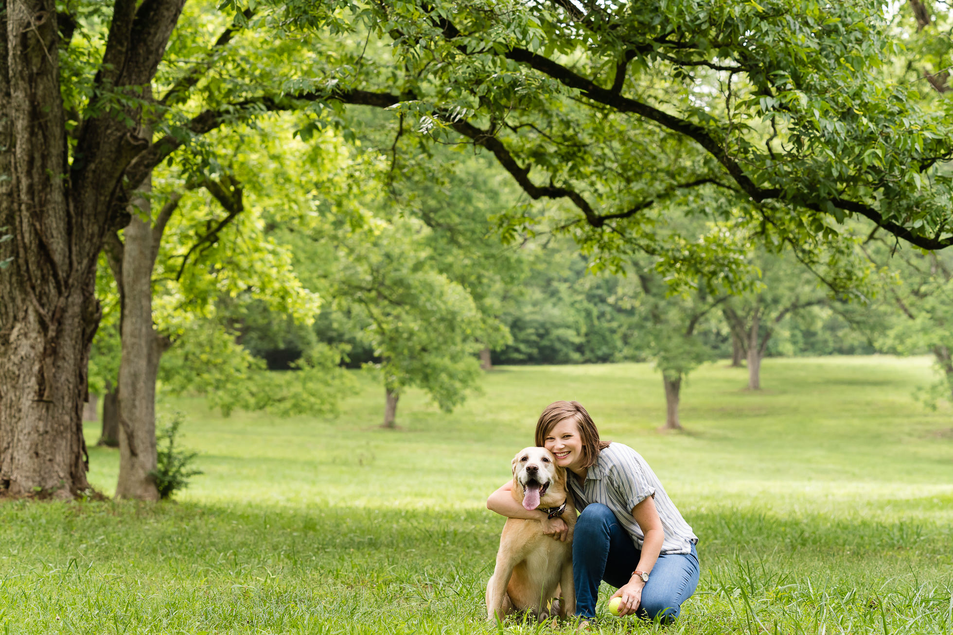dog field with owner girl