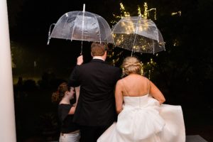wedding exit rain umbrellas