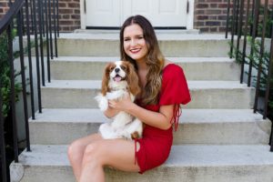 senior photos holding dog