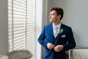 navy blue groom portrait