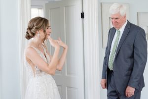 father daughter first look bride emotional