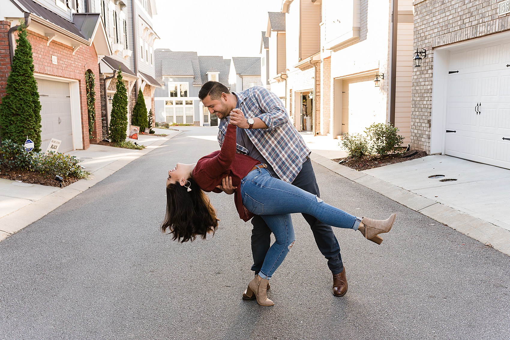 fun couple engagement home