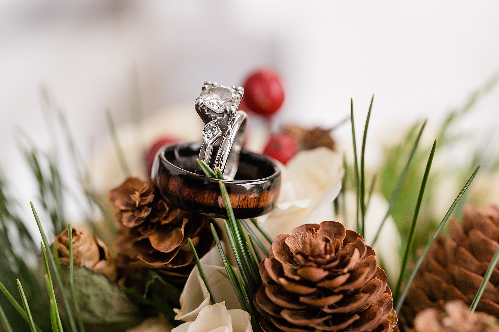 wedding rings on bouquet pinecones