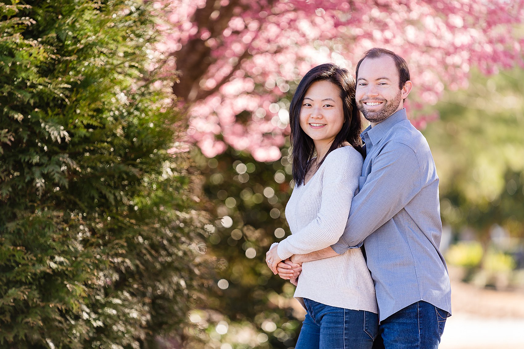 cherry blossoms couple engagement 