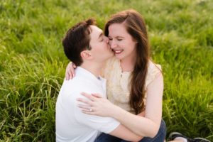 engagement couple in field