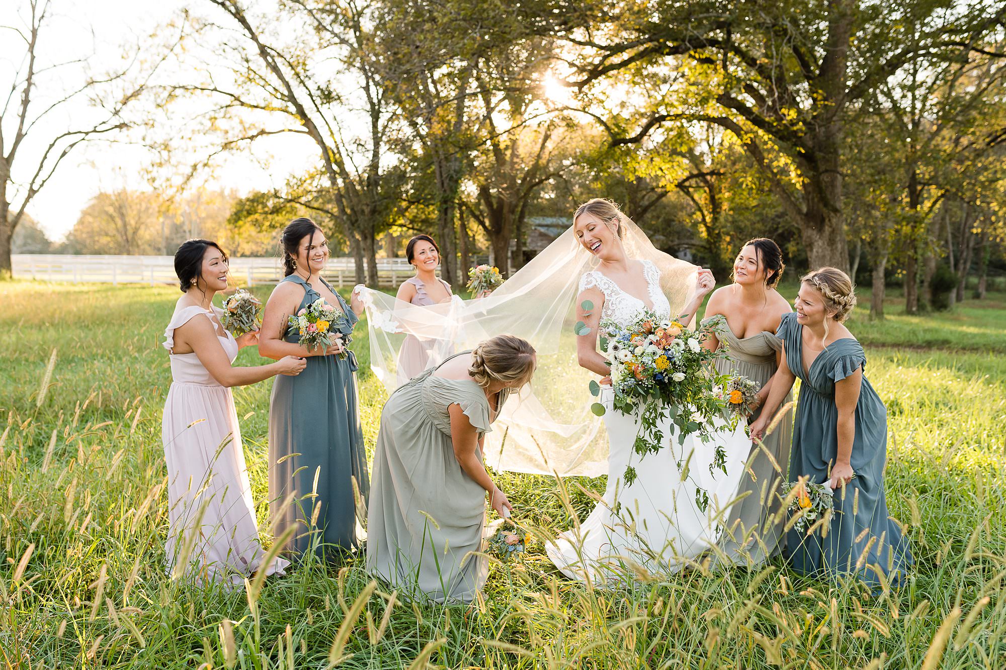 bridesmaids golden hour field wedding