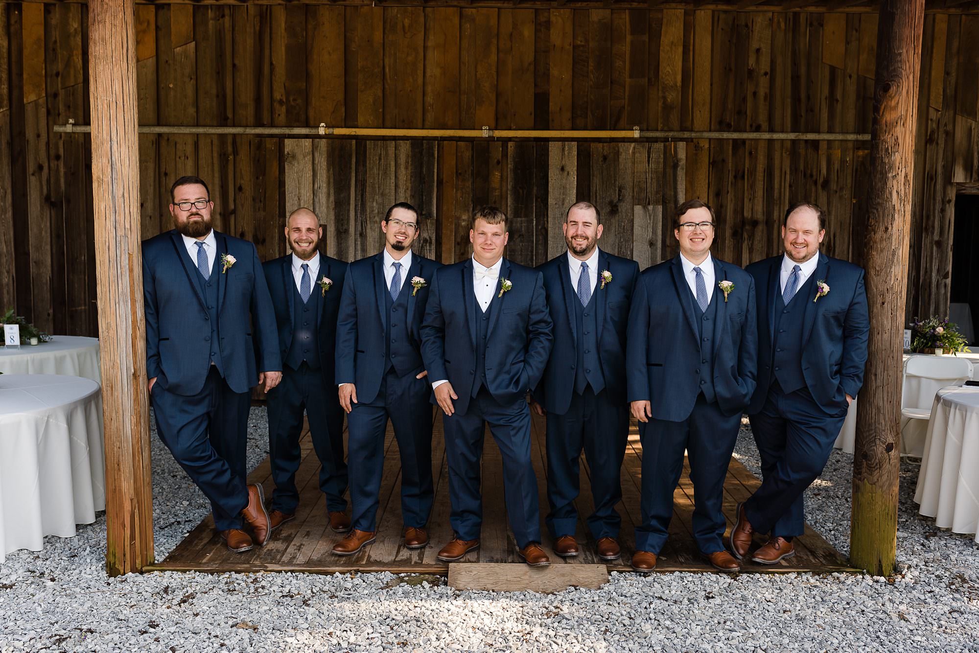 groomsmen barn farm wedding navy