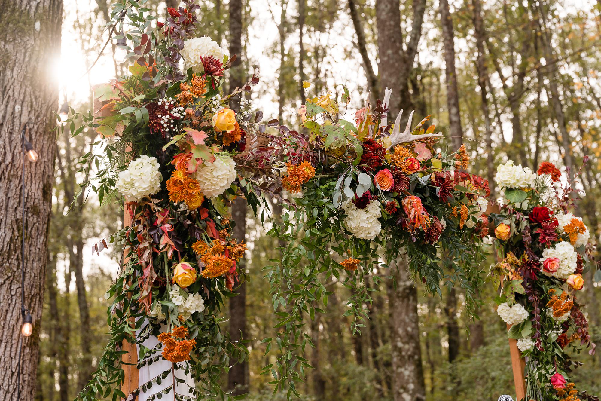 fall wedding antlers arbor florals