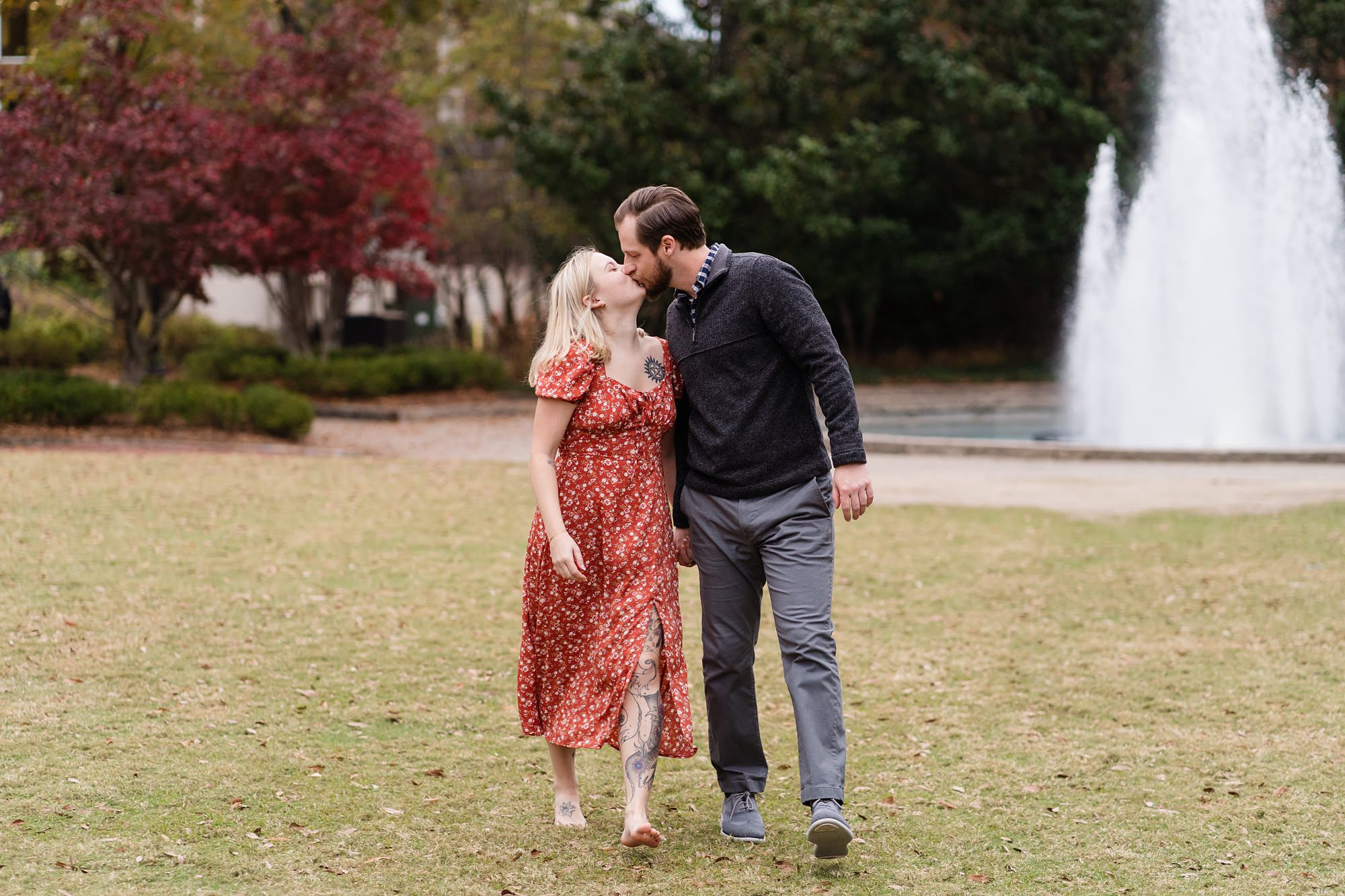 herty field fountain engagement couple