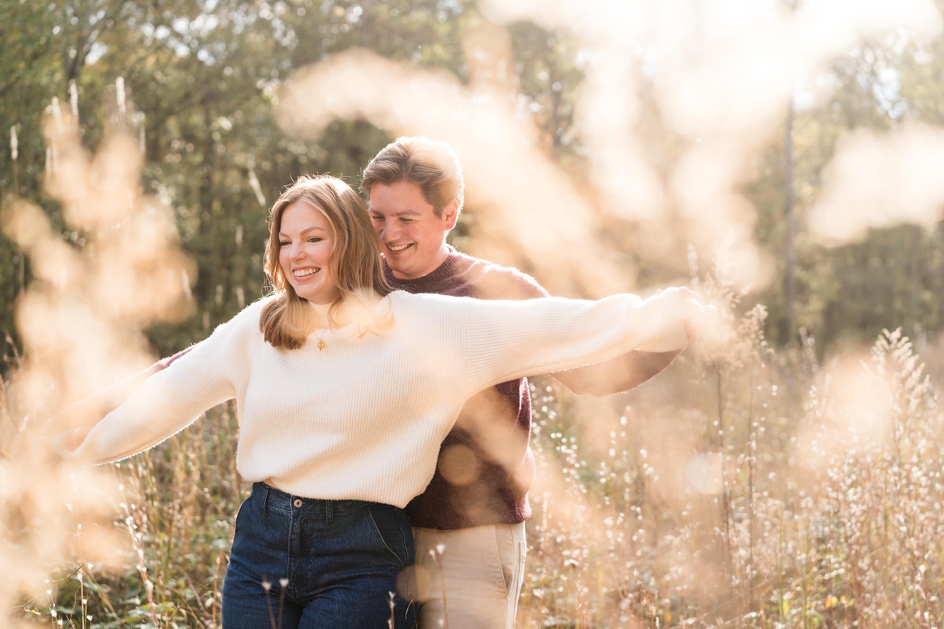 engagement couple field golden hour