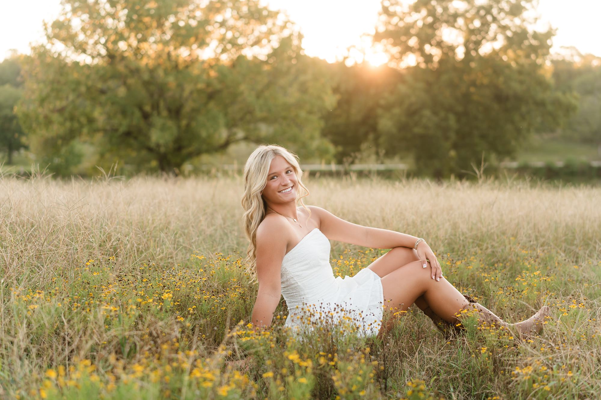 golden hour field sunset senior photographer wildflowers
