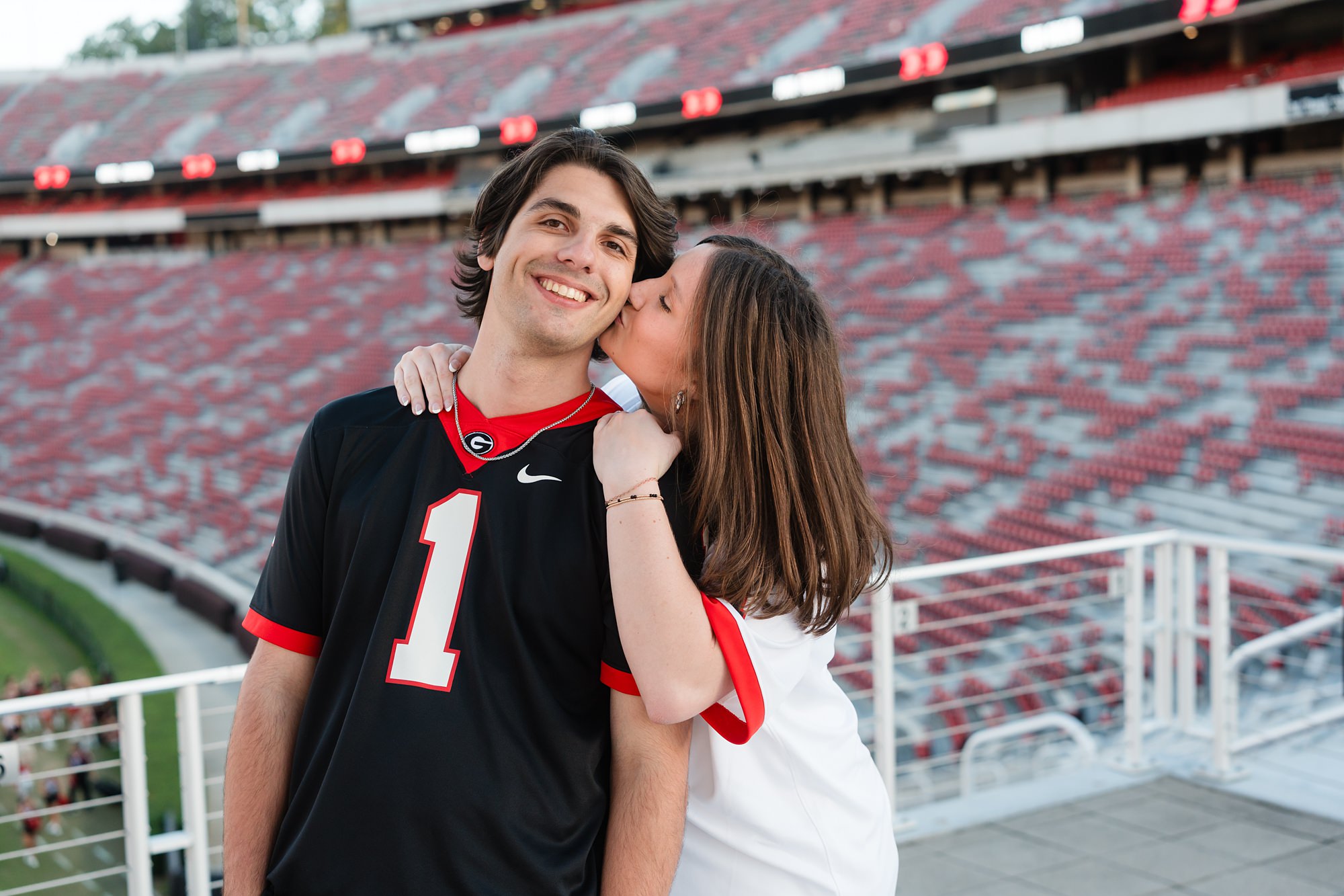 sanford stadium couple uga senior grad