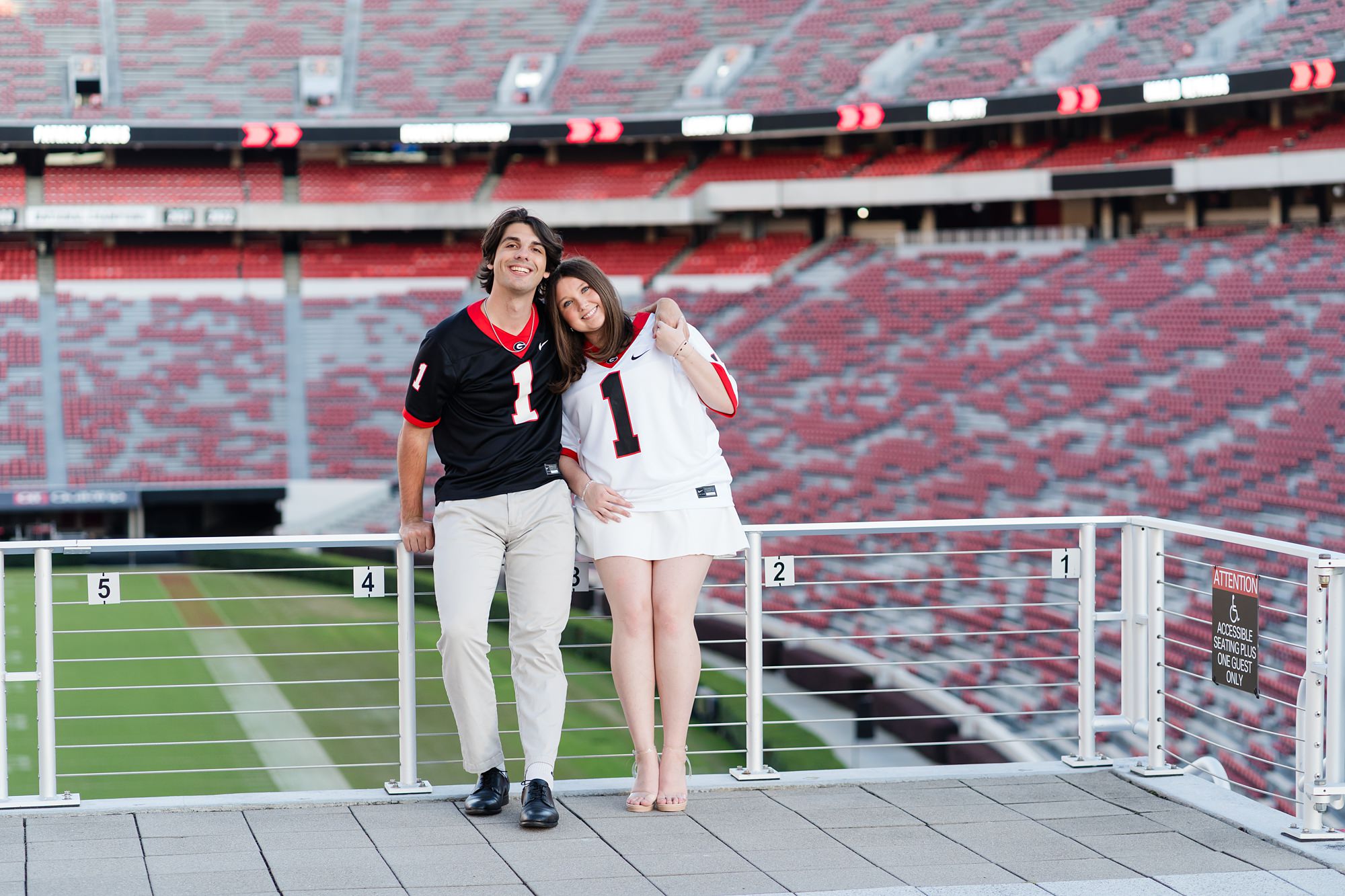 sanford stadium couple uga senior grad